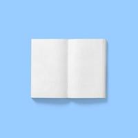 Back to school concept , hard cover blank white book middle open isolated on blue photo