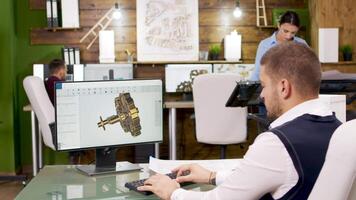 Construction engineer working on building mechanics on computer video