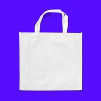 Tote bag fabric cloth shopping sack mockup isolated on blue background. photo