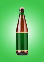 Beer Bottle Mock-Up with Blank Label on green background . oktoberfest concept. photo