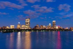 Night cityscape with reflections in water, Boston, USA photo