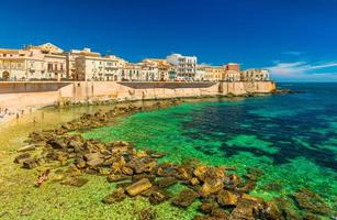 Cityscape of Ortygia. City beach in the historical center of Syracuse, famous place on Sicily, Italy photo