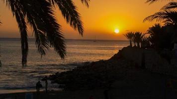 sunset in maspalomas, canary islands photo