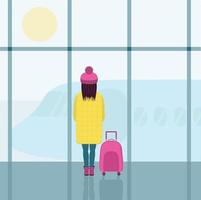 A girl in a bright yellow down jacket and a pink hat with a pink suitcase. A girl in the airport building , looking at the plane through the glass. vector