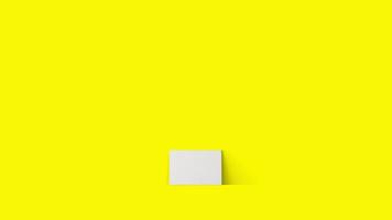 3d rendering laying empty blank white canvas isolated on yellow background. photo