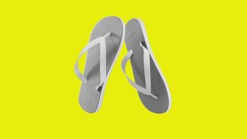 Tropical white sandals isolated on yellow background. suitable for your design element. photo