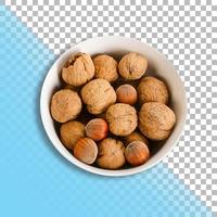 Top up view bunch of walnuts on white bowl isolated with transparent background. photo