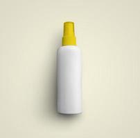 3D rendering blank white cosmetic plastic spray bottle with yellow cap isolated on grey background. fit for your mockup design. photo