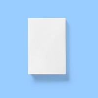 Back to school concept , hard cover blank white back close isolated on blue. photo