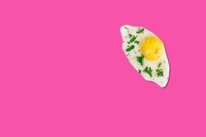 Cheese piece in Creative conceptual top view flat lay composition with copy space isolated on pink background in minimal style photo