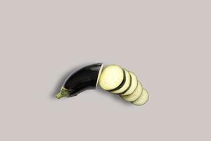 Top up up view sliced eggplant isolated on grey background. suitable for your design project. photo