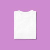 Top up up view round neck t shirt folded isolated on purple background. suitable for your design project. photo