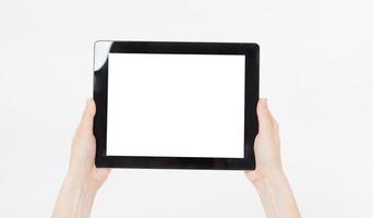 Hand holding black tablet isolated on white clipping path inside. Top view.Mock up.Copy space.Template.Blank. photo