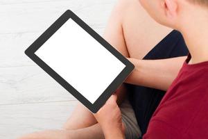 Man sitting with tablet in hands. Online shopping.Top view.Mock up.Copy space.Template.Blank. photo