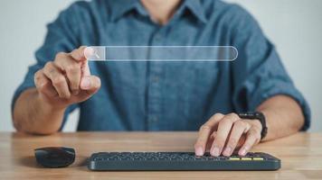 Man using a computer keyboard to Searching for information with the Search bar, Web browser, Data Search, Search Engine, Technology Concept photo