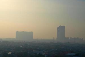 central Surabaya business district with tall tower buildings photo