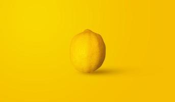 a lemon photographed on an orange background. an object photographed for wallpaper and background advertisement, promotion, poster, etc. photo
