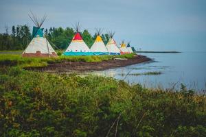 Traditional houses of native Americans installation photo