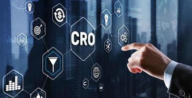 Conversion Rate Optimization. CRO Technology Finance concept Businessman pressing on a virtual screen photo