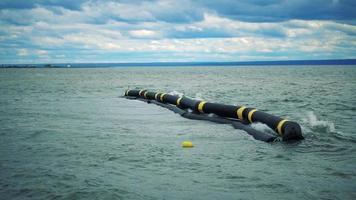 Wave-Break System Working in Slow Motion in the Ocean to Protect a Marina video