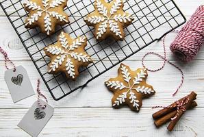 Gingerbread cookies on a metal baking rack photo