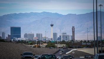 Las Vegas, Nevada- Las Vegas city surrounded by Red Rock mountains and Valley of Fire photo