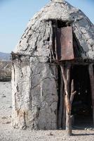 House of Himba tribe, in Kunene region, Namibia. Houses are made of earth and dung by the himba women.Green building