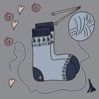 Cozy knitted socks, a ball of thread and knitting needles, comfortable winter clothes, vector hand draw illustration