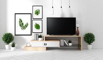 Maqueta de Smart TV con pantalla negra en blanco colgada en el gabinete y decoración de fama, estilo moderno de sala de estar zen. Representación 3d foto