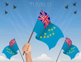 tuvalu banderas ondeando bajo el cielo azul vector