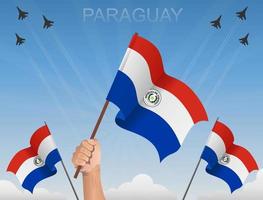 banderas paraguayas ondeando bajo el cielo azul vector