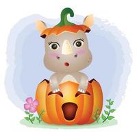 a cute rhino in the halloween pumpkin vector