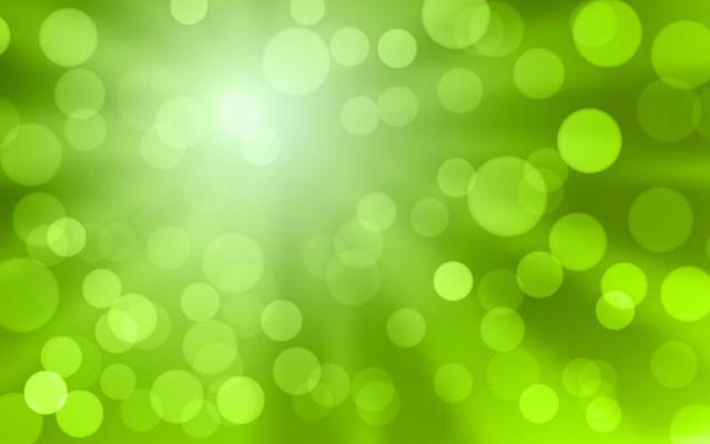 Blur green bokeh abstract background with sunburst