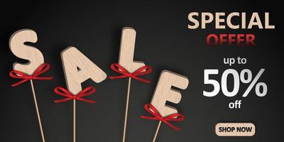 Sale. Wooden letters on sticks with red bows. Discount banner template