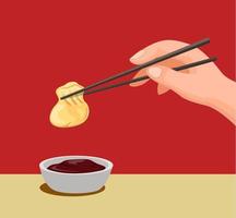 Hand dumpling with chopstick to sauce.traditional chinese food symbol in cartoon illustration vector