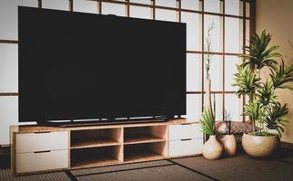 Old style, Mock up smart Tv on wooden cabinet design in room japanese style on floor tatami mat.3D rendering photo