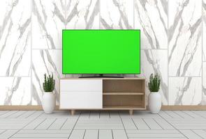 maqueta de televisión inteligente con pantalla verde en blanco colgada en la decoración del gabinete, estilo moderno de sala de estar zen. Representación 3d foto