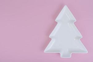 Empty white christmas tree plate for table Christmas festive setting. photo