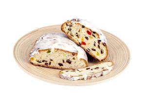 Traditional Christmas stollen with nuts and candied fruits. photo