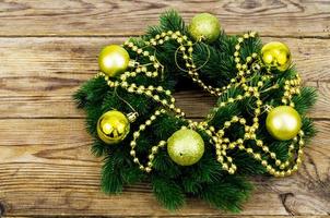 Christmas wreath with gold ornaments. Studio Photo. photo