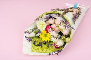 Creative holiday bouquet of fresh and dried flowers photo