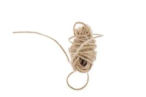 Small skein of rope isolated on white background photo