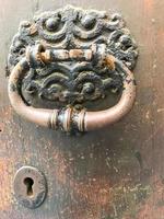 Antique vintage door with metal handle. photo