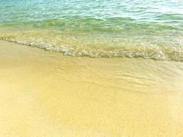 Sea coast, beach, footprints in sand. Photo