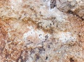 Background, texture of natural stone of pink shade. photo