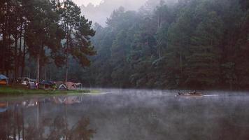 camping and travel  Beatiful nature panorama view of Pang Ung lake in the mist at sunrise. photo