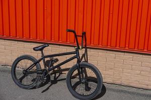 Black BMX bicycle outdoors photo