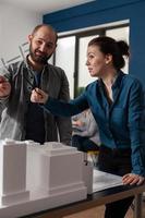 Architect work team talking at professional office photo