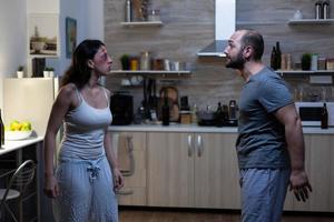 Yelling couple having violent dispute and relationship problems photo