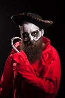 Man with long beard dressed up like a spooky pirate photo